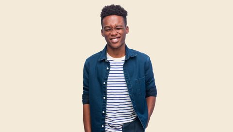 man wearing denim shirt