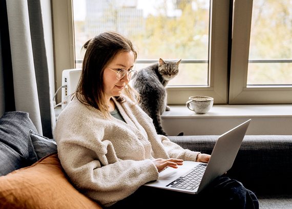 Woman working laptop cat img text